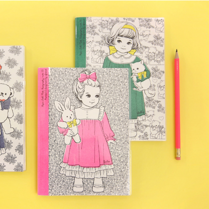 Coloring books with illustrations of a girl and her toys on a yellow background