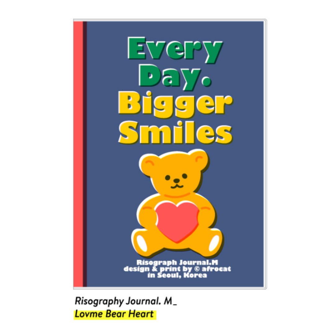 Journal with a teddy bear holding a heart on a blue cover with colorful text.