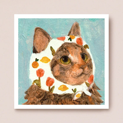 Illustration of a cat wearing a floral dress on a light blue background