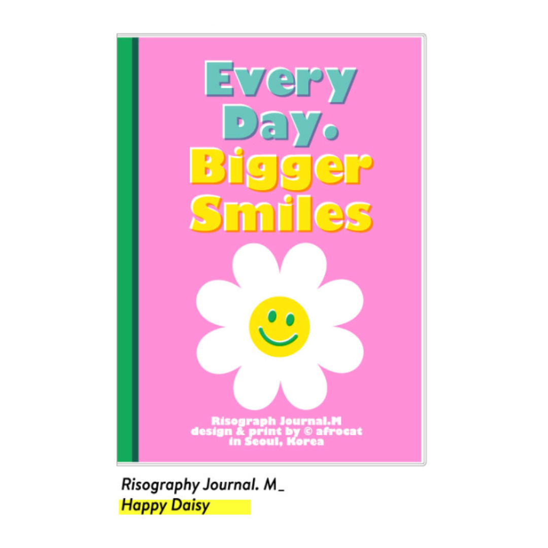 Pink journal with a smiley flower and text on a white background